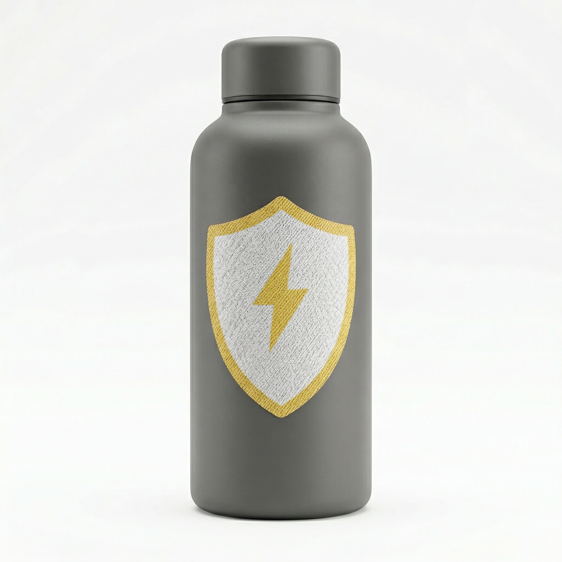 Gray water bottle with a shield emblem featuring a yellow lightning bolt on a white background